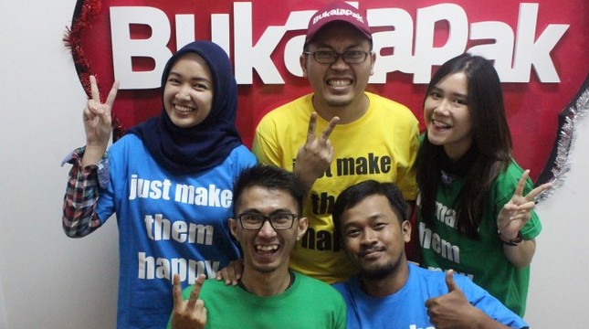 CEO of Bukalapak Achmad Zaky (middle)