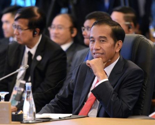Presiden Jokowi saat mengikuti agenda KTT ke-20 ASEAN-JEPANG di Philippines International Convention Center (PICC), Manila, Filipina, Senin (13/11)
