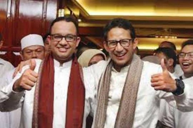 Anies Baswedan (Left) Sandiaga Uno (Right)