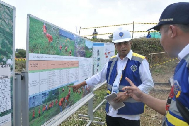 Minister of Transportation, Budi Karya Sumadi, after reviewing the program of double track work of KA train in Tenjoayu Village, Sukabumi on Saturday (7/4).