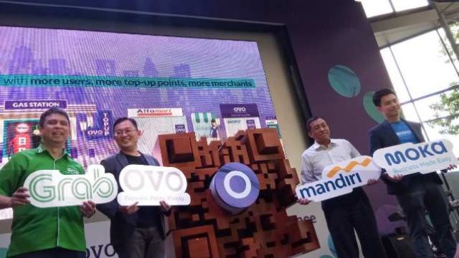 Platform pembayaran digital Ovo melakukan kerja sama dengan empat perusahaan strategis yaitu Grab, Alfamart, Moka dan Bank Mandiri.