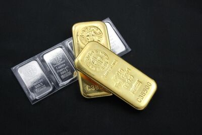 Gold and platinum bars depicting wealth and investment potential