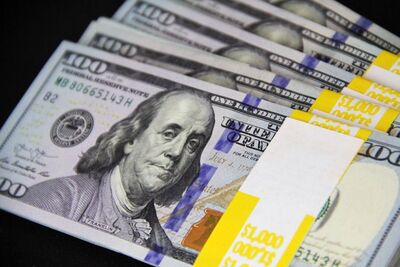 Stacked US hundred dollar bills emphasizing wealth and finance