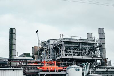 Industrial factory with metal pipes and equipment for manufacturing