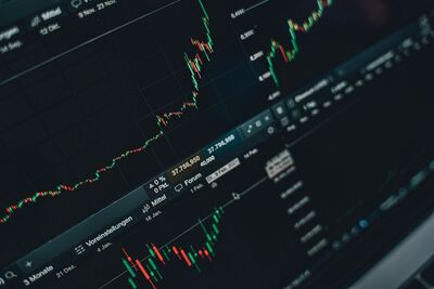 Stock market trading screen displaying financial growth and charts